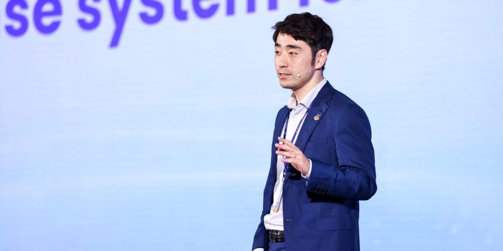 Zhang-Tianyi-speaking-at-Ant-International-partner-conference-in-April-in-Hong-Kong-e1755046263136.jpg