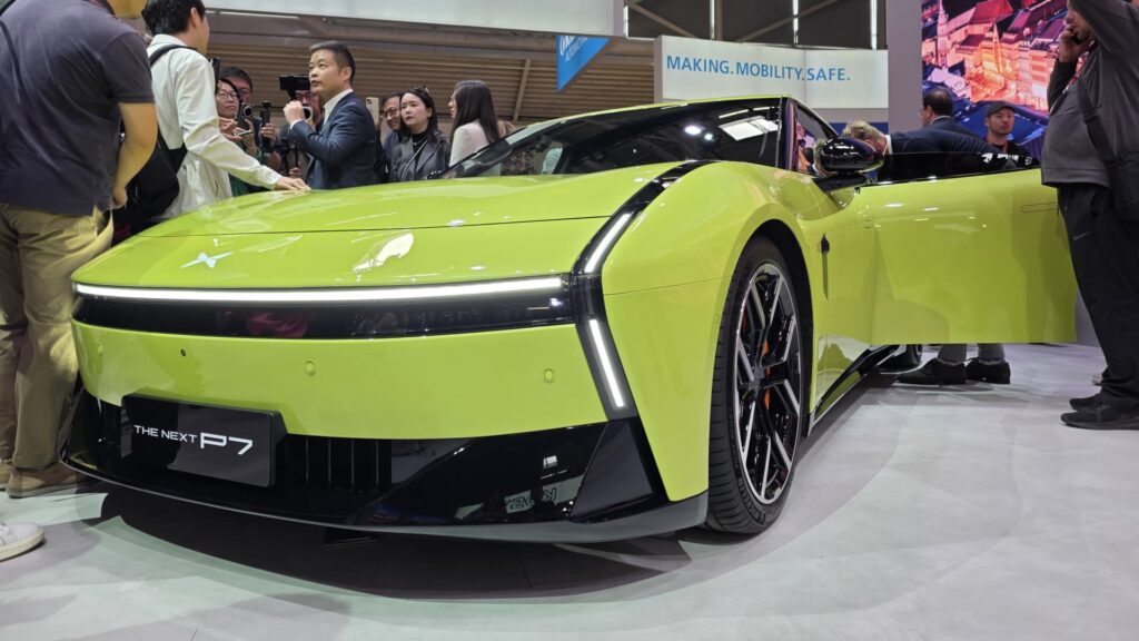 108195426-1757328127105-Xpeng_CEO_with_Car.jpg