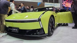 108195426-1757328127105-Xpeng_CEO_with_Car.jpg